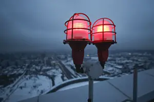 Editor's Picks: Signal lights are seen on the roof of a residential compound in Moscow