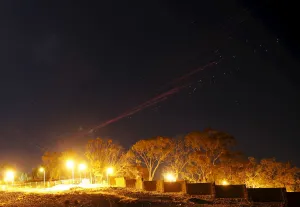 Security Prints: The sky over Sanaa is illuminated by anti-aircraft fire during a Saudi-led air strike in