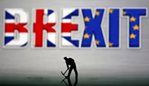 A small toy figure is seen in front of a Brexit logo in this illustration picture A small toy figure is seen in front of a Brexit logo in this illustration picture