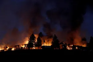 California Prints: Smoke and flame rise from the Hilton Sonoma Wine Country during the Tubbs Fire in Santa
