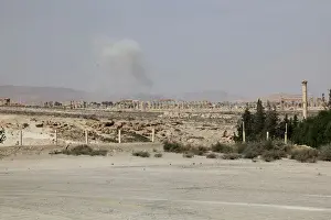 Smoke rises due to what activists said was shelling from Islamic State fighters