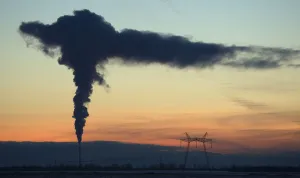 Belarus Prints: Smoke rises from the chimney stalk of a gas-fired power station during a windless evening