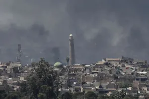 Mideast Prints: A smoke rises above the old city as Iraqi forces fight Islamic State militants in Mosul