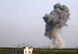 Mideast Prints: Smoke rises as Turkish-backed Free Syrian Army fighters advanced in north of Afrin