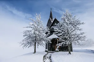 Snow-covered chapel is seen in Tulfes