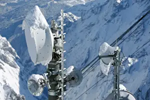 Weather Prints: Snow covered transmitting antennas are pictured on top of the highest German mountain