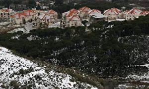 Lebanon Prints: Snow covers mountains in Sawfar village