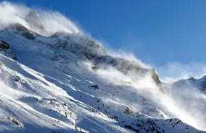 Weather Prints: The snow sails to the top of a snowy mountain in Saint-Pancrace as winter weather
