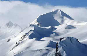 France Prints: The snow sails to the top of a snowy mountain in Saint-Pancrace as winter weather