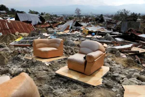Indonesia Prints: A sofa is seen among the ruins of a house after an earthquake hit Balaroa sub-district in