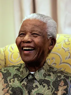 Trending: Former South African President Nelson Mandela laughs during an interview with