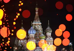 St Basils Cathedral in Moscows Red Square is seen through illuminated New Year