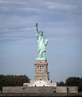 The Statue of Liberty is pictured with no people surrounding her base in New York