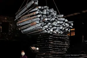 New Prints: Steel bars are pictured in a mill in Chau Khe village outside Hanoi