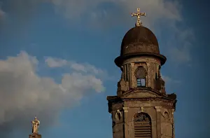 A stopped clock tower marking the time of the 1972 earthquake is seen in the old