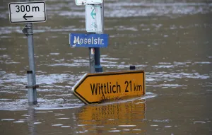 Germany Prints: The street sign for the Moselle street is flooded by the river Moselle in Reil