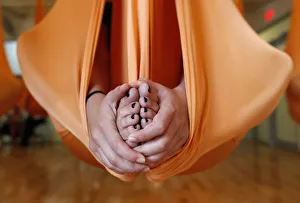 A student takes part in an antigravity yoga class at the Om Factory in New York A student takes part in an antigravity yoga class at the Om Factory in New York