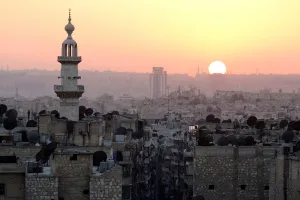Mideast Prints: The sun sets over Aleppo as seen from rebel-held part of the city