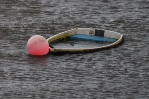 A sunken boat is seen half submerged after Storm Eleanor in Galway Bay A sunken boat is seen half submerged after Storm Eleanor in Galway Bay