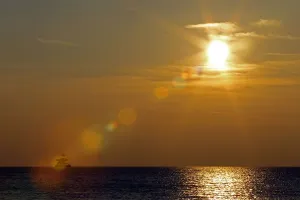 Images Dated 2011 February: A sunset view of an offshore floating oil platform along the Tirreno sea coast in front