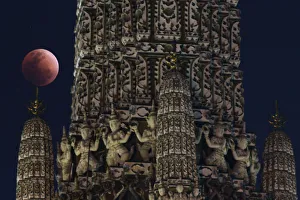 Lunar Prints: A super blood blue moon is seen during an eclipse at a temple in Bangkok