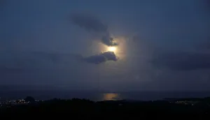 Lunar Prints: The super blue moon rises at a horizon in Legazpi