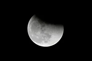 Lunar Prints: The super blue moon is seen during a total lunar eclipse in Beijing
