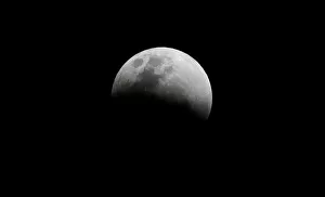 The super blue moon is seen during a total lunar eclipse in Legazpi