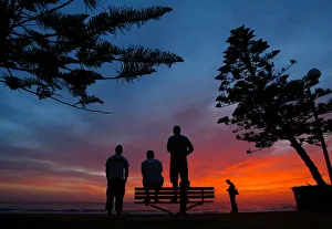 SURFERS OBSERVE THE WAVES AT SUNRISE IN SYDNEY SURFERS OBSERVE THE WAVES AT SUNRISE IN SYDNEY