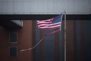 Sandy Prints: A tattered U. S. flag flies at the Con Edison Substation in Downtown Manhattan after