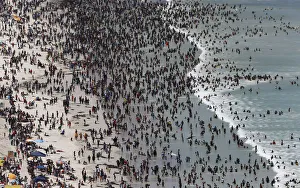 Thousands of people flock to celebrate New Years Day on Cape Towns Muizenberg beach Thousands of people flock to celebrate New Years Day on Cape Towns Muizenberg beach