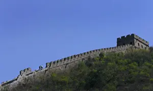 Tourists walk on a part of the Huanghuacheng section of Chinas Great Wall which was recently