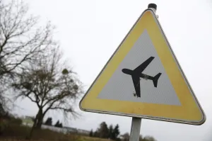 France Prints: A traffic sign warning of low flying aircraft stands near to LSC Westerwald flight club