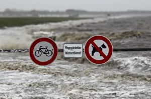 Prints of Traffic signs are seen on the North Sea beach near the town of Norddeich, December 5, 2013 Germany Prints: Traffic signs are seen on the North Sea beach near the town of Norddeich