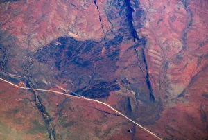 Prints of A truck travels along a dirt road in outback Western Australia in this aerial picture September 5, 2016. Picture taken September 5, 2016. REUTERS/David Gray TPX IMAGES OF THE DAY Australia Prints: A truck travels along a dirt road in outback Western Australia