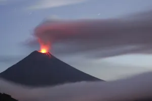 Latin America Prints: The Tungurahua volcano spews molten rock and large clouds of gas and ash, south of Quito