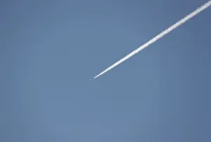 Syria Prints: A Turkish fighter jet flies over the town of Hassa on the Turkish-Syrian border in Hatay