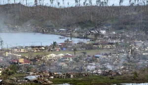 A view of the devastation caused at the height of Typhoon Bopha in the coastal town of A view of the devastation caused at the height of Typhoon Bopha in the coastal town of