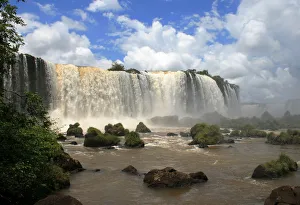 Prints of A view is seen of the Iguazu Falls, one of the worlds largest, from the Brazilian side of the Iguazu River that delimits the border with Argentina Brazil Prints: View of the Iguazu Falls from the Brazilian side of the Iguazu River that delimits