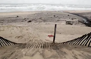 Coastline Prints: A view shows a damaged sand dune from erosion of the Atlantic Ocean coastline in Soulac