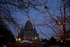 : A view shows the Sacre Coeur basilica at the Butte Montmartre in the early morning in