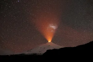 Volcano Prints: The Villarrica Volcano is seen at night from Pucon town