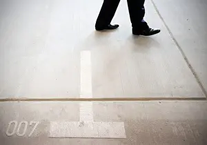 Prints of A visitor walks on the car park place numbered 007 in the north part of the compound of the German Federal Intelligence Agency (BND) Germany Prints: Visitor walks on the car park place numbered 007 at German Federal Intelligence Agency