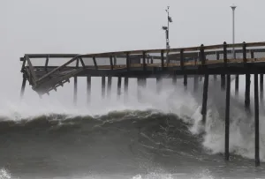 Waves break along the pier which was damaged during Hurricane Irene, in Ocean City Waves break along the pier which was damaged during Hurricane Irene, in Ocean City