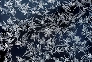 A window with frost pattern is pictured on top of highest German mountain, the Zugspitze