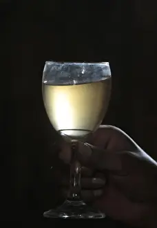 A wineglass of Patero wine produced by La Casa Vieja (Old House) wine cellar in Concepcion
