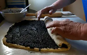 Easter Prints: Woman bakes traditional cakes on the eve of Orthodox Easter in the town of Bobruisk