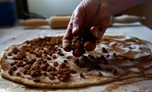 Easter Prints: Woman bakes traditional cakes on the eve of Orthodox Easter in the town of Bobruisk
