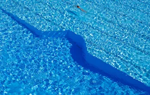 A woman swims in a public pool as temperatures reach new record highs in Hanau A woman swims in a public pool as temperatures reach new record highs in Hanau