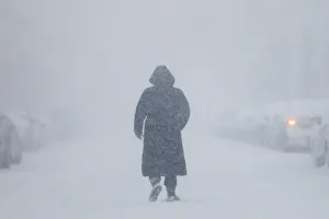 Prints of A woman walks down the street during a blizzard in Long Beach, New York, U.S. January 4, 2018. REUTERS/Shannon Stapleton TPX IMAGES OF THE DAY USA Prints: A woman walks down the street during a blizzard in Long Beach
